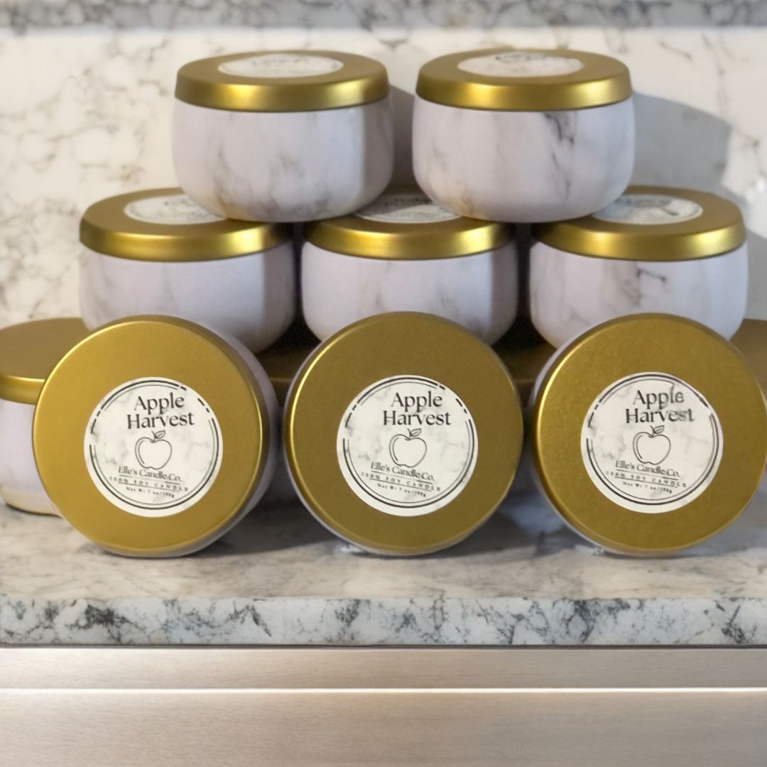 Apple Harvest soy candle in a glass jar, scented with crisp apple and warm cinnamon, shown on a white background.