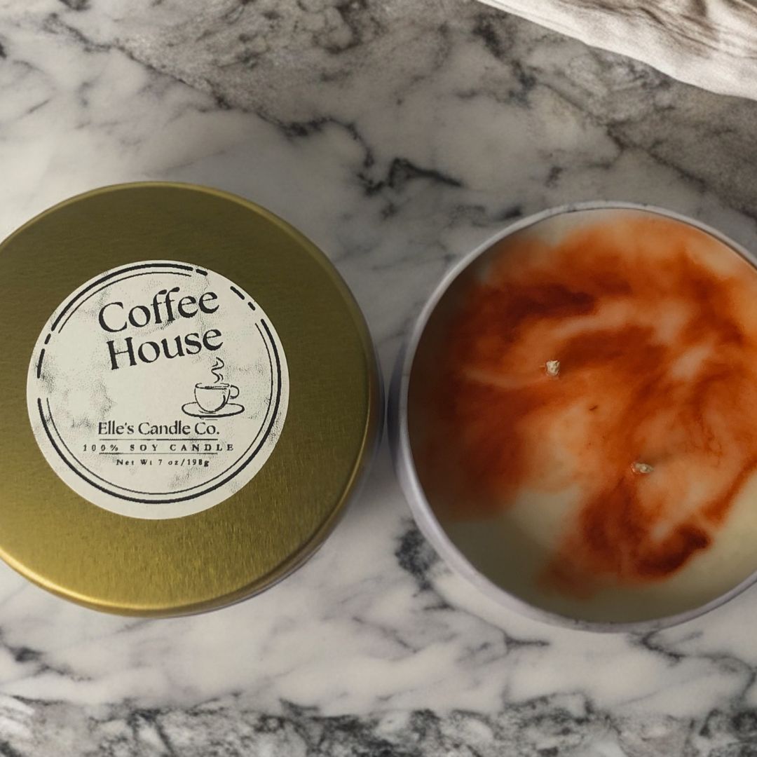Coffee House soy candle in a glass jar, scented with brewed coffee and vanilla, styled with cozy neutral tones.