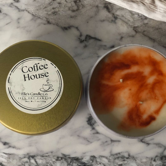 Coffee House soy candle in a glass jar, scented with brewed coffee and vanilla, styled with cozy neutral tones.